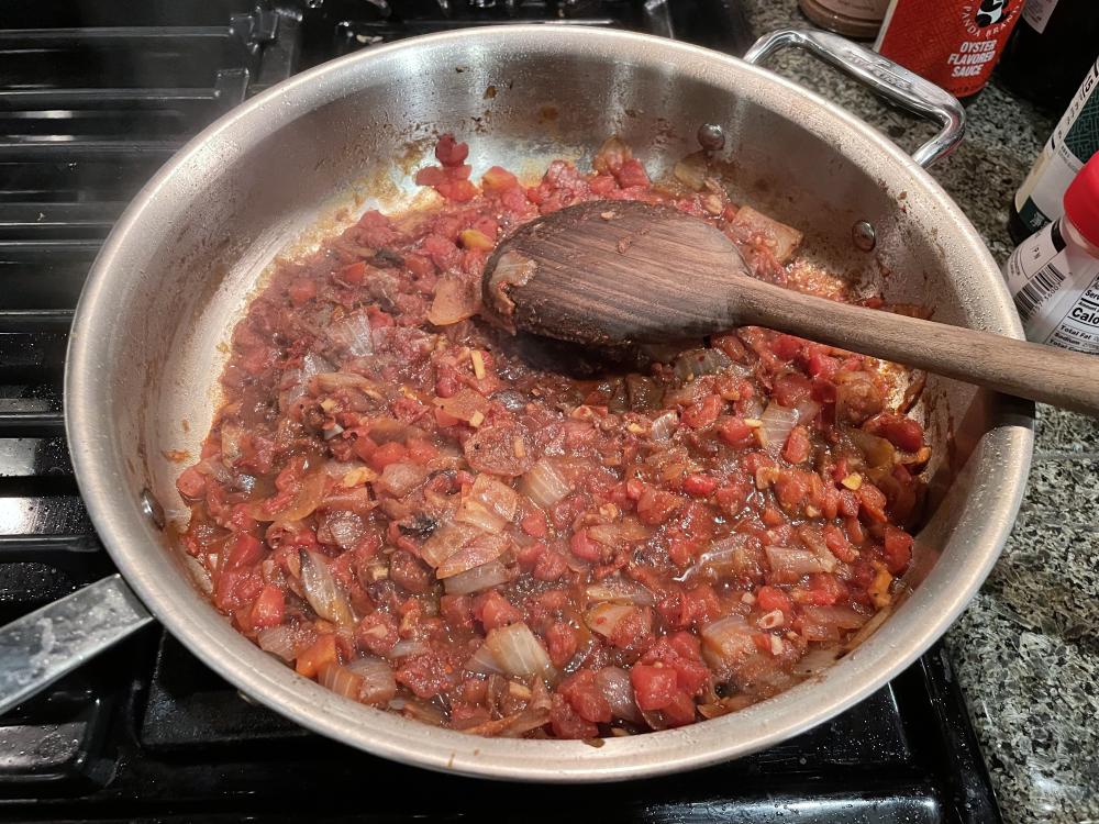 Photo of onions and tomatoes with spices